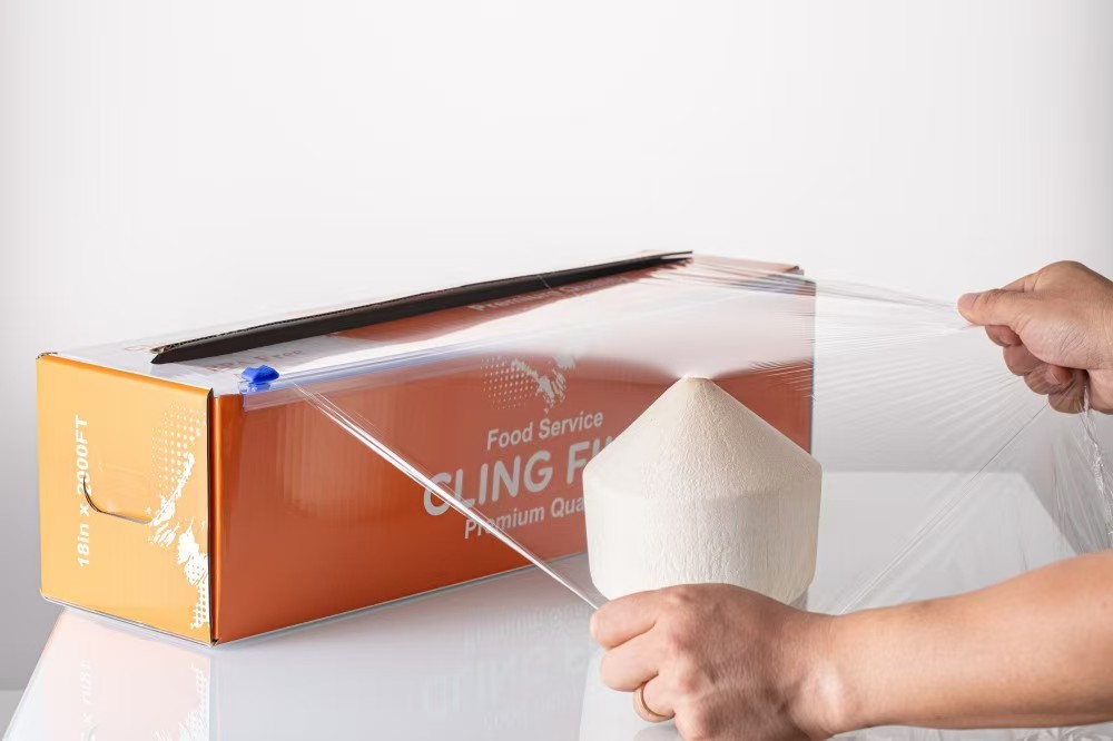 Manual dispensing from a cling film cutter box