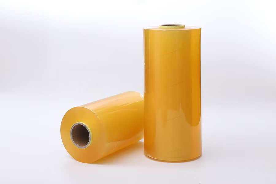 Large PVC cling film rolls in standing and horizontal positions