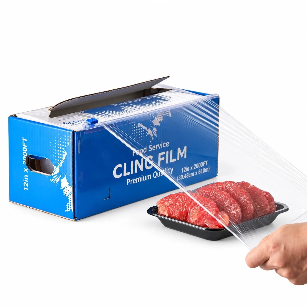 Pulling cling film from a cutter box over a tray